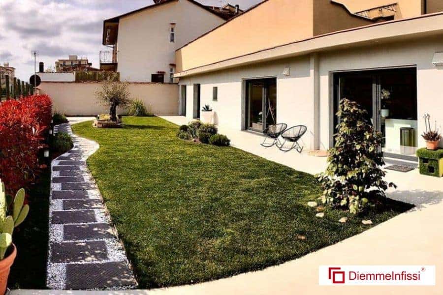 Ristrutturazione ex officina a Pistoia con infissi in legno alluminio Internorm